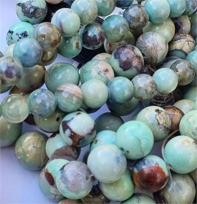 Агат голубой – тонированный, нить 19 см, диаметр 8 мм 17305